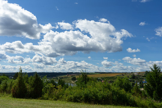 Summer Landscape with River and Clouds. Country landscape. © vitold78