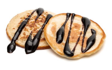 Two pancakes isolated on white background cutout.