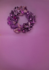 Christmas wreath on a purple background