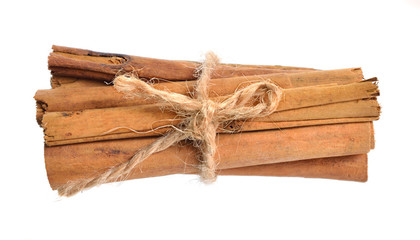 Bark from Cinnamomum verum or true cinnamon or Ceylon cinnamon. Isolated on white background