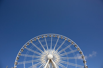 Shot with the sun still low in the sky it gives the Liverpool Ferris Wheel a white and gold glow which looks really cool