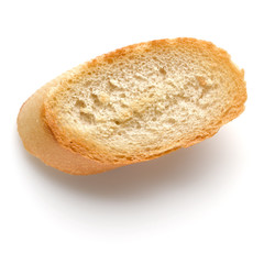 Toasted baguette slice isolated on white background close up.  Toast, crouton.   Top view.