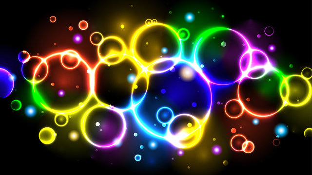 Rainbow neon color bright bubbles, abstract multicolor background with circles, sparkles and bokeh