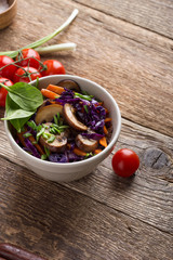 Stewed vegetables bowl  with cabbage, carrot and mushrooms