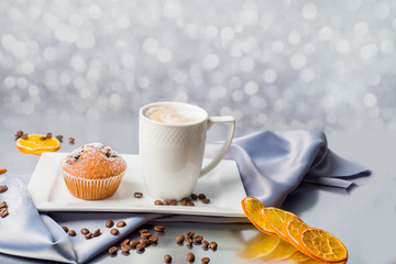 cup of coffee and a muffins