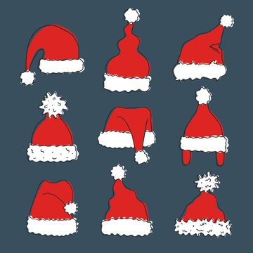 Set of hand drawn hats of Santa Claus.