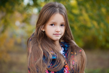 Fototapeta premium Portrait of a beautiful young little girl
