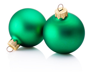 Two Christmas green baubles isolated on white background