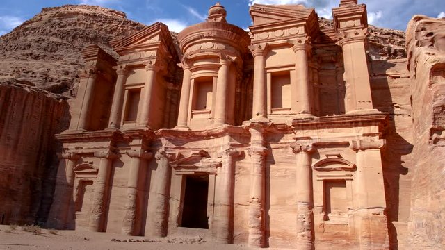 Stunning view from a cave of the Ad Deir - Monastery in the ancient city of Petra, Jordan. Incredible UNESCO World Heritage Site.