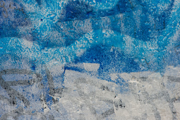 Blue painting and wall graffiti closeup