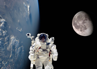 planet earth and moon orbit with ship and stronaut. Elements of this image furnished by NASA f