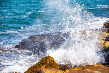 waves of the Atlantic Ocean crashing against the rocks