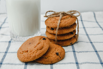 Chocolate chip oatmeal cookies and a glass of milk