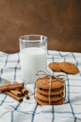 Homemade oatmeal cookies with nuts and raisins and milk