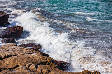 waves of the Atlantic Ocean crashing against the rocks