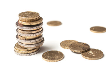 closeup of euros coins pile on white background