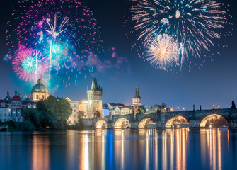 Fototapeta na wymiar Beautiful fireworks above Charles bridgeat at night, Prague, Czech Republic