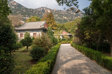 Fototapeta na wymiar Mountain behind Temple of Supreme Purity of Tai Qing Gong at Laoshan