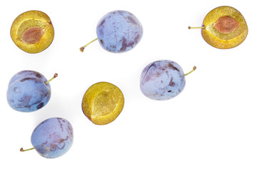 plums isolated on a white background with copy space for your text. Top view. Flat lay pattern