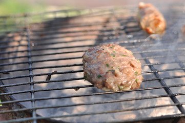 Traditional Cypriot meze and kebap barbecue party in the garden with delicious mix meat and chicken kebaps