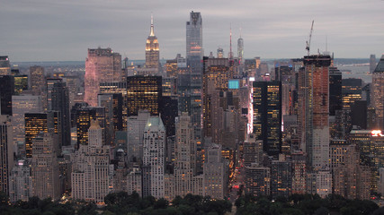 AERIAL Stunning New York City skyline city lights with the Central park by night