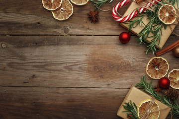 Christmas composition in rustic style on a wooden table. Top view.