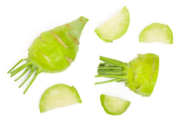 Fresh kohlrabi with green leaves isolated on white backround. Top view. Flat lay