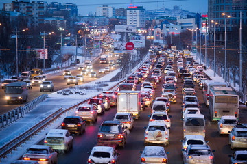 Fototapeta na wymiar Traffic jam during a snowfall in Vladivostok