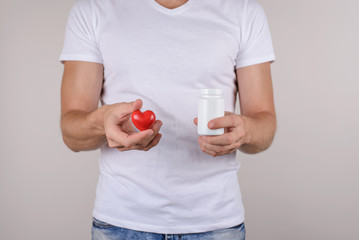 Cropped closeup view studio photo portrait of serious guy people person holding choosing advising...