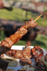 Traditional Cypriot meze and kebap barbecue party in the garden with delicious mix meat and chicken kebaps