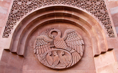 A bird feeding its chicks its blood - old symbol of self-sacrifice on the wall of Armenian Orthodox...