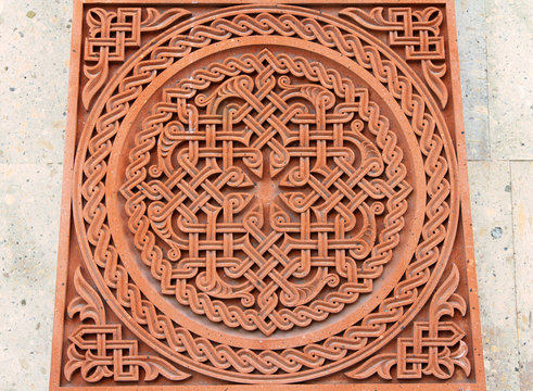 Traditional tufa stone carving ornament on a wall of Armenian Orthodox Church