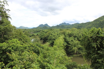 Fototapeta na wymiar panoramic view on Mae Klong Area from a train trip, Kanchanaburi, Thailand