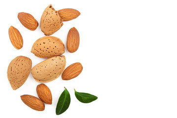 almonds with leaves isolated on white background with copy space for your text. Top view. Flat lay pattern
