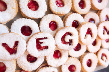 Homemade christmas cookies with vegan lettering - traditional 