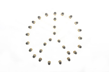 peace sign made of bullets.