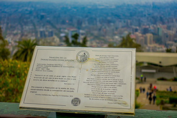 SANTIAGO, CHILE - OCTOBER 16, 2018: Informative sign of description of Statue of the Virgin Mary on the top of the San Cristobal Hill