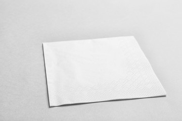 Clean napkin on grey background. Personal hygiene