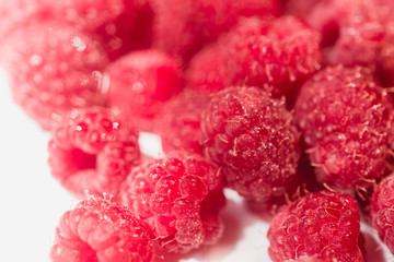 Background texture of dripping raspberry.