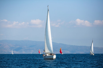 Obraz premium Sailing luxury boats during the yacht regatta in Aegean Sea, Greece.
