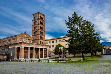 Obraz premium The church, the bell tower, and the liturgical fountain 
