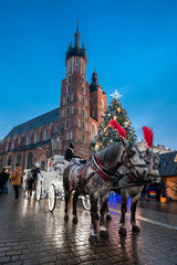 Naklejka na ściany i meble Christmas market in Krakow at night