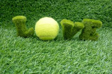 Tennis Happy New Year with tennis on green grass