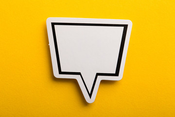 Speech Bubble Isolated On Yellow Background