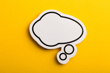 Speech Bubble Isolated On Yellow Background