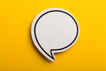 Speech Bubble Isolated On Yellow Background
