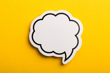 Speech Bubble Isolated On Yellow Background