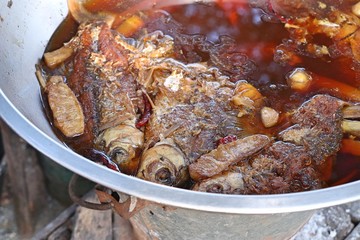 Boiled fish sauce at market