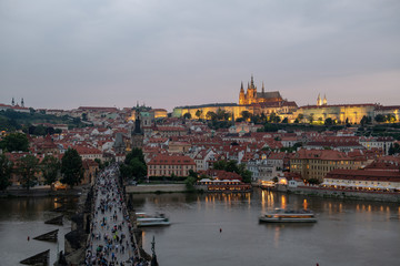 Obraz premium Prague, Czech Republic. Charles Bridge and Hradcany (Prague Castle) with St. Vitus Cathedral and St. George church evening dusk, Bohemia landmark in Praha.