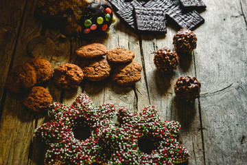 Chocolate cookies, gingerbread cookies and dark chocolate with mint for christmas cream, holiday concept.